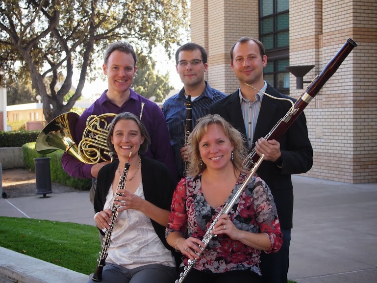 Avenue Winds Standing (L to R): Daniel Wood, horn; Dan Ferreira, clarinet; Charles Moehnke, bassoon Sitting (L to R): Adrienne Malley, oboe; Melanie Keller, flute