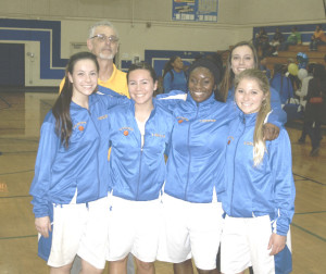 THE LADY PANTHERS honored their senior basketball players before Thursday’s game with Vallejo. Standing with Benicia coaches Randy Saitz and Paige Pangelinan are (from left) seniors Faithe Pangelinan, Brittany Portello, Keylai Boughton and Michelle Minahen.