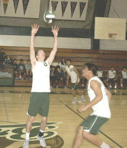 SPSV'S PATRICK LAGO (left) sets up teammate Patrick Basco for a kill attempt against Pinole Valley.