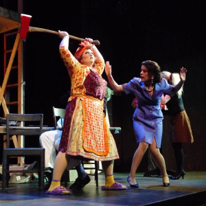 BELINDA (Jessica Dahlgren, right) tries to calm things down as Mrs. Clackett (Kaufman) wields a hatchet. In the background: Benicia High grad Kasey Spilman as Poppy, right.