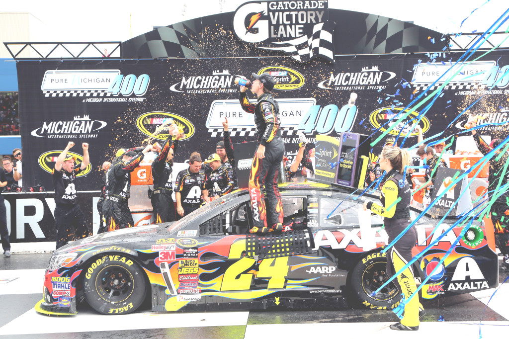 JEFF GORDON celebrates in Victory Lane after winning the NASCAR Sprint Cup Series Pure Michigan 400 at Michigan International Speedway on Sunday.