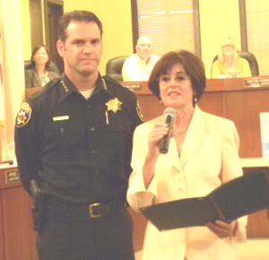 MAYOR ELIZABETH PATTERSON read a proclamation last week honoring outgoing police Chief Andrew Bidou, who becomes Vallejo’s police chief next month. Donna Beth Weilenman/Staff
