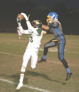 MARIA CARRILLO defensive back Fhestus Chomba (left) steps in front of Benicia receiver Weston Carr and intercepts a pass in the second quarter Friday night.