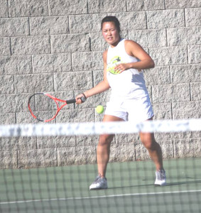 MICHELLE LI powered her way to a 6-0, 6-1 victory in No. 1 singles for Benicia at American Canyon.