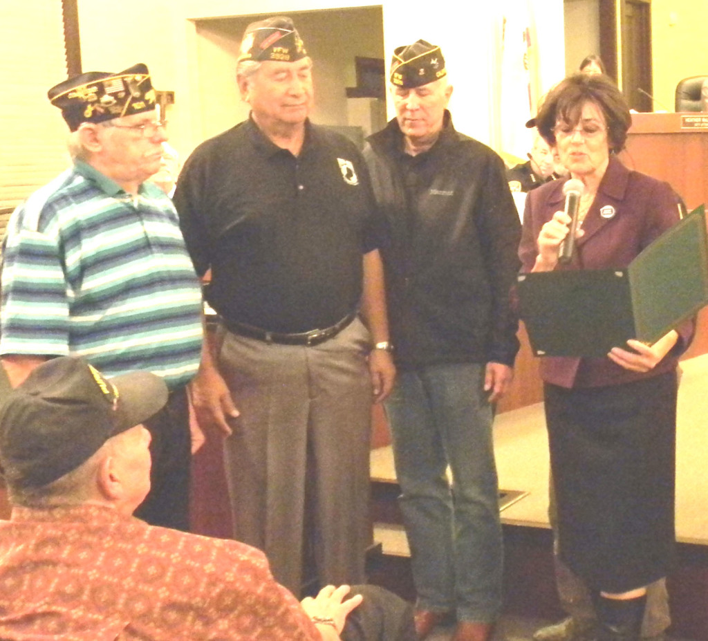 AMONG THE VETERANS attending Tuesday’s City Council meeting, at which Mayor Elizabeth Patterson proclaimed Benicia a Purple Heart City were (from left) Purple Heart recipient Russ Stanley (seated), Ed Heffernan, Ernie Gutierrez and Pete Caggiano. Not pictured: Dan Schaefer and Charles Cain. At the same meeting, Stan Golovich asked Council and citizen support for his effort to have Interstate 780 named part of the Purple Heart Trail in honor of women recipients of the medal, which is conferred upon those who have been wounded or killed in combat. Donna Beth Weilenman/Staff