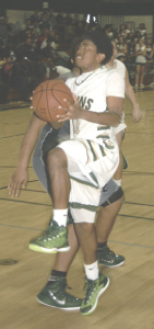 B.J. STANDLEY drives to the basket against El Cerrito.
