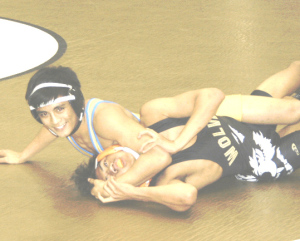 CHRISTIAN RAMOS (left) seems to be enjoying his match against American Canyon’s Jason Lucas.