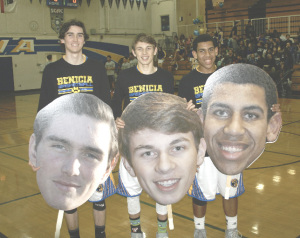 BENICIA HIGH seniors (from left) Brandon Barrett, Brady Christopher and Kendal Vargas were honored before Tuesday night’s season finale against American Canyon.