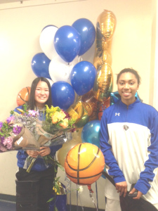 BENICIA SENIORS Michelle Li (left) and Quilaina Dollar were honored by the Lady Panthers basketball team before Tuesday’s game against Bethel.