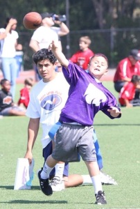 CARLOS LARAESPADA JR. heaves the game-winning touchdown pass in double overtime.