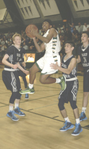 B.J. STANDLEY leaps through traffic in SPSV’s North Coast Section semifinal playoff game against Marin Catholic.