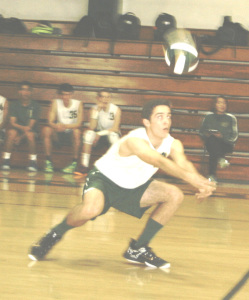 SPSV SOPHOMORE Anthony Olmes digs out a ball against Richmond in boys volleyball action Tuesday night.