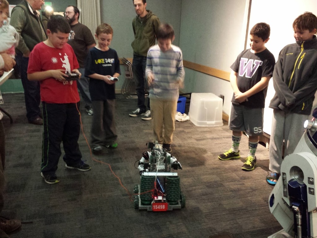 JAMES NEWCOMB and Wyatt and Patrick Carvalho practice robot driving skills at a Benicia Makerspace workshop. Aaron Newcomb photos