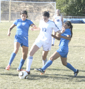 KATIE LOVELACE (center) scored 10 goals as a sophomore for the Lady Panthers last season.