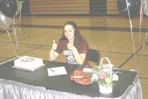 CASSIDY JANNSON gives two thumbs up after signing a full-ride scholarship to play volleyball for Texas Southern University in Houston after graduating Benicia High.