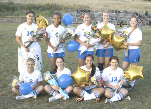 BENICIA HIGH’S girls soccer program honored its seniors before Tuesday’s regular-season finale against American Canyon. Seniors pictured are (back row from left) Esperanza Chavez, Kamlynne Fontan, Sara Hingley, Kaela Thyrion, Hannah Church; (front row) Brandy Caffey, Tatiana Soglin, Abigail Heuschel and Tayla Rund.