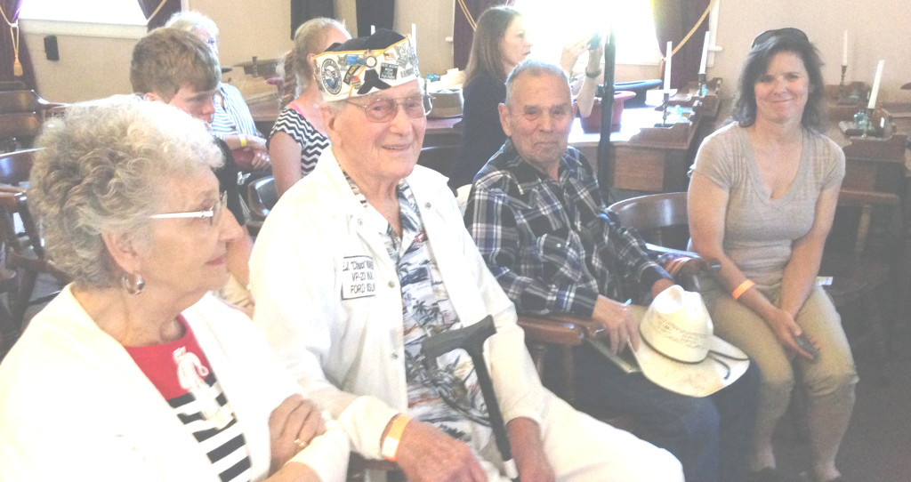 FROM LEFT, Judy and Earl J. "Chuck" Kohler, a WWII Pearl Harbor survivor, of Concord; and Joe Matta, a WWII Guadalcanal survivor, and his daughter, Sherry Shimel, listen to music Sunday at the Benicia Capitol State Historic Park during a celebration of V-E Day's anniversary.