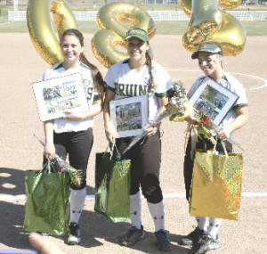 SPSV’S SOFTBALL program honored its three senior players before Wednesday night’s home game against Salesian. The Lady Bruin seniors are (from left) Adriana Vargas, Taya de Alba and Jennifer Adams.