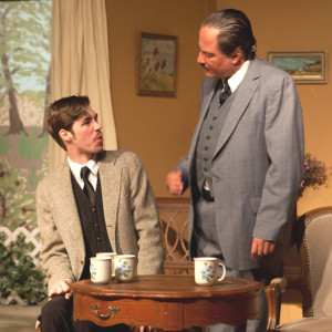 POIROT (Ken Sollazzo, right) questions the deceased’s assistant (Nicholas Hargrave as Edward Raynor).