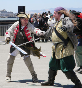 What's a pirate festival without swordplay? A pair of swashbucklers cross blades in a shoreline battle at the Northern California Pirate Festival. Donna Beth Weilenman/Staff
