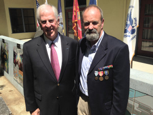 Donna Beth Weilenman / Staff James Hilderbrand, right, wears his military medals U.S. Rep. Mike Thompson, left, helped him secure. 