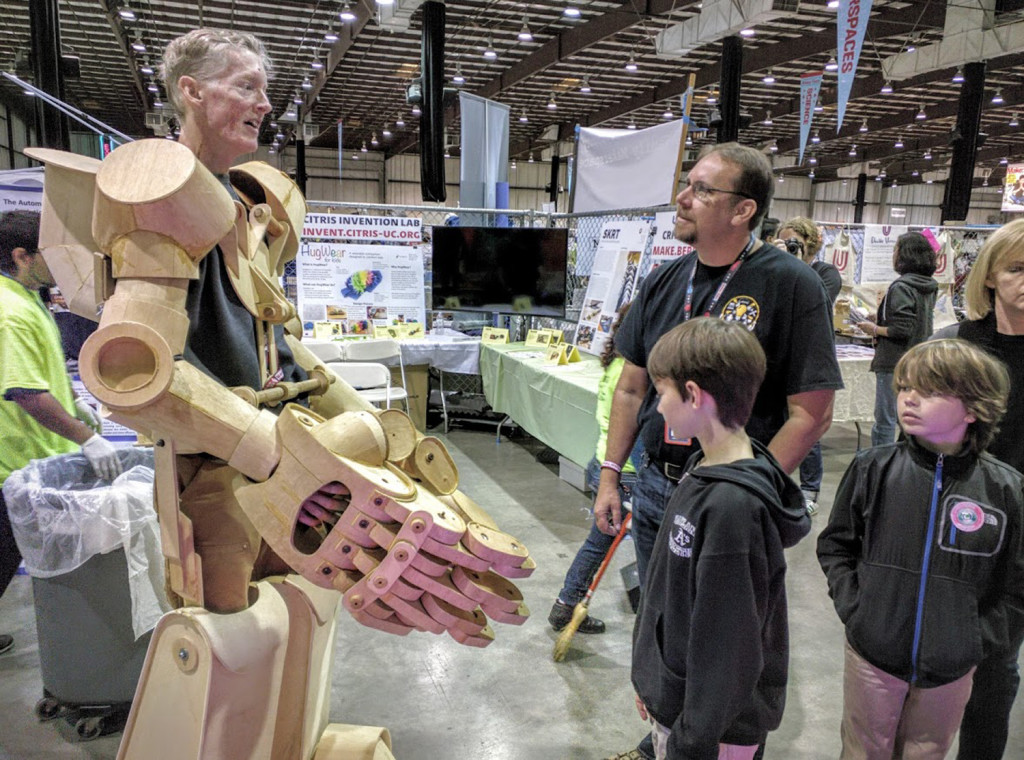 VISITORS are given a demonstration of a plywood exoskeleton at a recent Bay Area Maker Faire. Benicia Makerspace’s grand opening is Saturday. Courtesy Aaron Newcomb