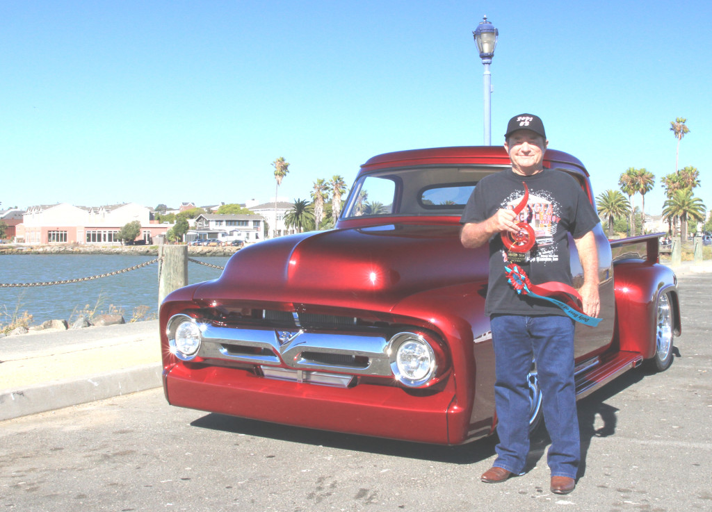 CALVIN FISK of Benicia shows off the Best in Show award and his 1953 Ford pickup that was the toast of the annual Hot August Nights competition. Keri Luiz/Staff