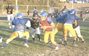 BENICIA QUARTERBACK Riley Pitkin gets ready to roll out during Saturday’s scrimmage.