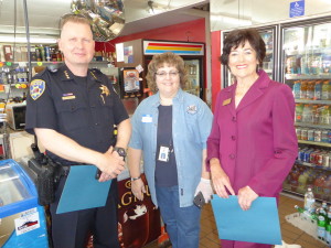 (Left to right) Benicia Police Chief Erik Upson, Solano Public Health specialist Robin Cox and Mayor Elizabeth Patterson were on hand to kick off the healthy makeover of Bob's Liquor and Food Monday. (Photo by Elizabeth Warnimont)