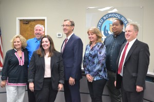 (Left to right) Benicia Unified School District school board clark Diane Ferrucci, President Gary Wing, assistant superintendent of educational services Marie Morgan, Superintendent Charles Young, trustee Stacy Holguin, trustee Andre Stewart and trustee Peter Morgan pose for a picture to close out the last school board meeting of the 2015-2016 school year. This was also the last meeting for Marie Morgan, who will be succeeding Dr. Patty Wool as the superintendent of Walnut Creek School District in July. (Photo by Nick Sestanovich)