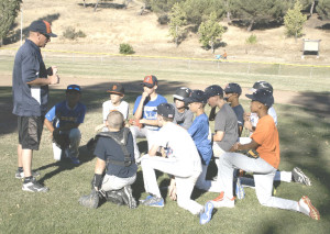 THE BENICIA Little League 10-11 all-star team, managed by Josh Gibbons (left), opens District 53 play on Saturday against St. Helena in Fairfield.