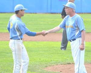 JIM BOWLES (right) has always had a close relationship with his players and led the Panthers to 11 league championships and four Sac-Joaquin Section titles in 16 years as manager.
