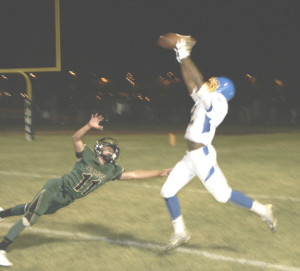 BENICIA RECEIVER Kyani McFall hauls in a 23-yard TD pass against Maria Carrillo.