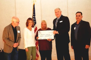 (Left to right) Benicia Community Action Council board members Fred Railsback and Michele Hughes joined Executive Director Viola Robertson to accept a $25,000 grant presented by Refinery Manager Don Wilson and Operations Superintendent Jim Petrellese. (Photo courtesy of Sue Fisher Jones)