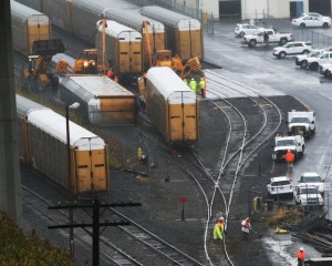 One of the derailed cars (Center), as seen from the vista point at the Benicia Bridge looking down onto Bayshore Road. (Photo by Ed Ruszel)