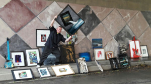 Benicia artist Randy Bernard displays some of the works he has collected from Benicia artists for "Flood the Streets with Art Day" Friday, Nov. 25. (Photo by Randy Bernard)