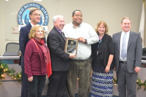 Outgoing Benicia Unified School District trustee Andre Stewart (Third from right) was honored at Thursday's school board meeting. Pictured are (left to right) Superintendent Charles Young, Trustee Diane Ferrucci, President Gary Wing, Stewart, Trustee Stacy Holguin and Trustee Peter Morgan. (Photo by Nick Sestanovich) 