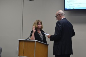 Stacy Holguin takes the oath of office administered by Solano County Superintendent of Schools Jay Speck. (Photo by Nick Sestanovich)