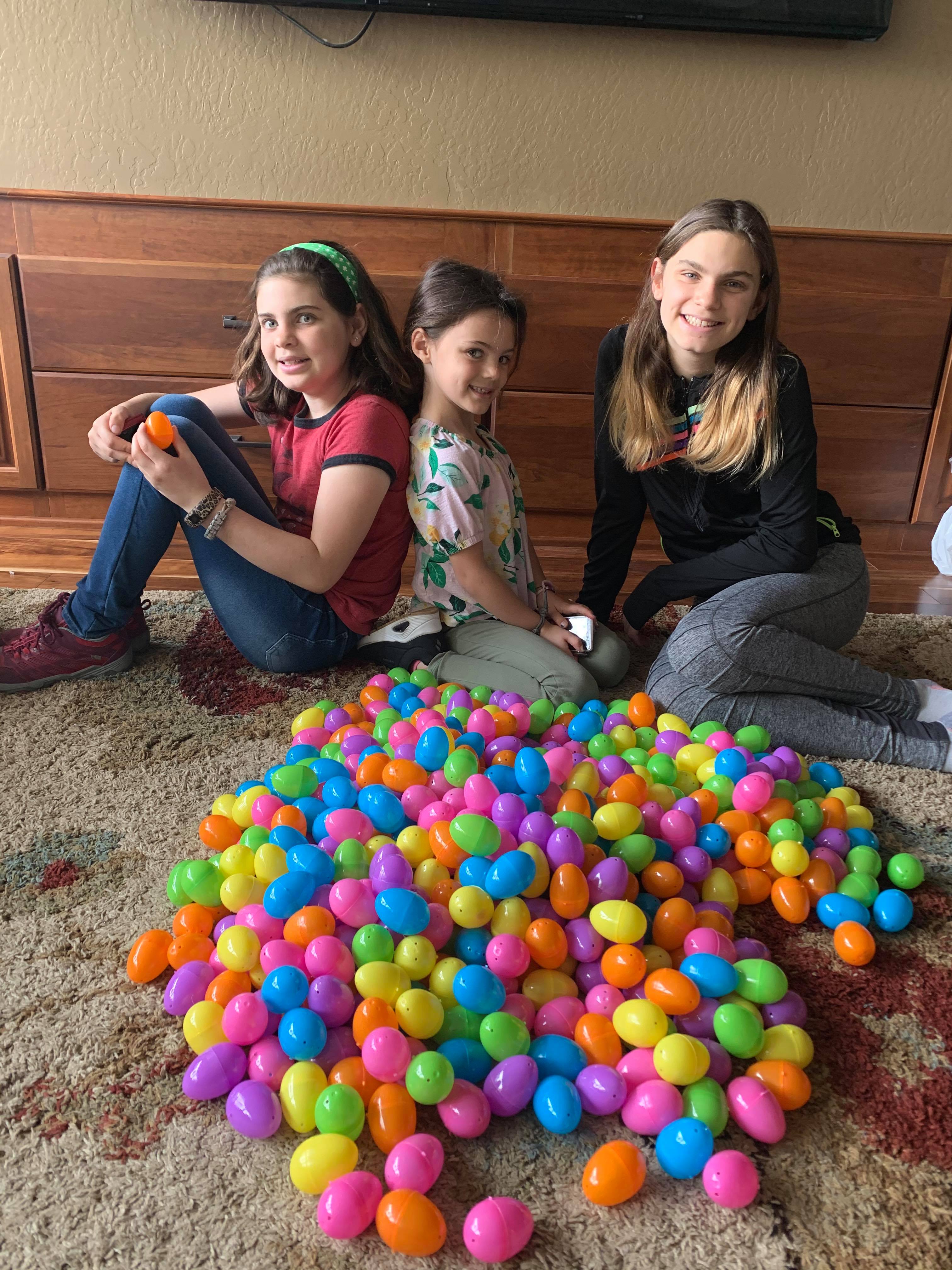 Three Benicia sisters stuff 500 plastic Easter eggs with chocolate for